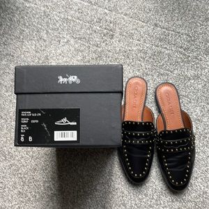 Coach loafer mule in black leather with gold rivets